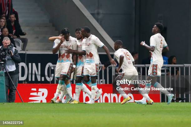 Axel Disasi Mhakinis Belho of AS Monaco celebrates his goal with his teammates during the Ligue 1 match between Lille OSC and AS Monaco at Stade...