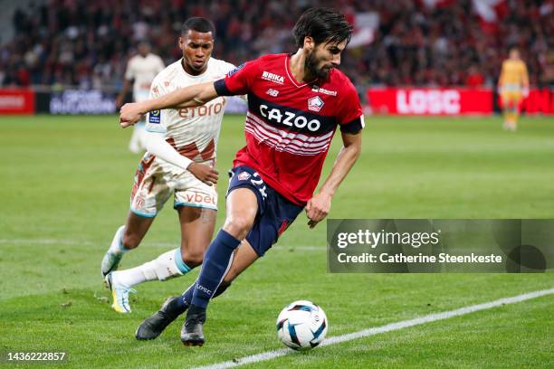 Andre Filipe Tavares Gomes of Lille OSC controls the ball against Jean Lucas De Souza Oliveira of AS Monaco during the Ligue 1 match between Lille...