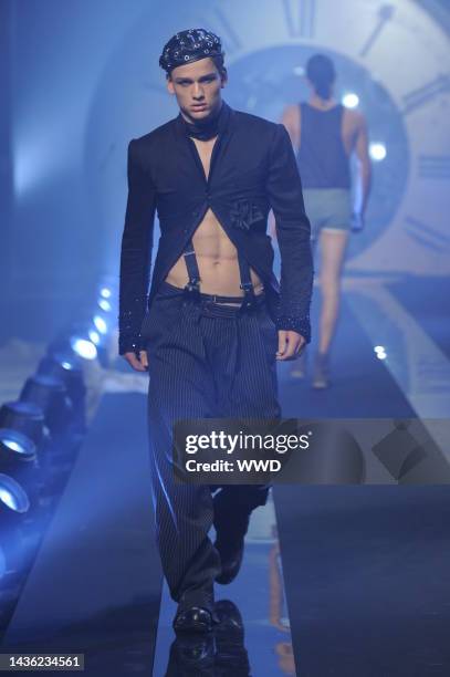 Model on the runway at John Galliano's spring 2011 menswear show.