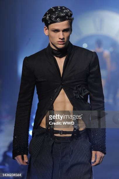 Model on the runway at John Galliano\'s spring 2011 menswear show.