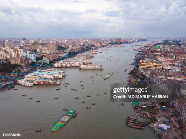 dhaka cityscape. skyline of dhaka, bangladesh. sadarghat launch terminal in dhaka. aerial view of dhaka city bangladesh - bangladesh dhaka stockfoto's en -beelden