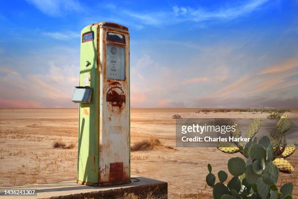 retro style scene with old gas pump in arizona desert - abandoned gas station stock pictures, royalty-free photos & images