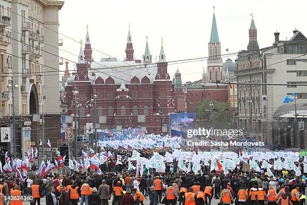 People attend the May Day parade towards Red Square on May 1, 2011 in Moscow, Russia. May Day is a major national holiday in Russia. The Russian...