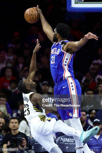 Joel Embiid of the Philadelphia 76ers blocks Aaron Nesmith of the Indiana Pacers during the first quarter at Wells Fargo Center on October 24, 2022...