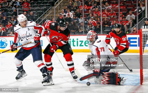 Charlie Lindgren of the Washington Capitals makes the second period save on Miles Wood of the New Jersey Devils at the Prudential Center on October...