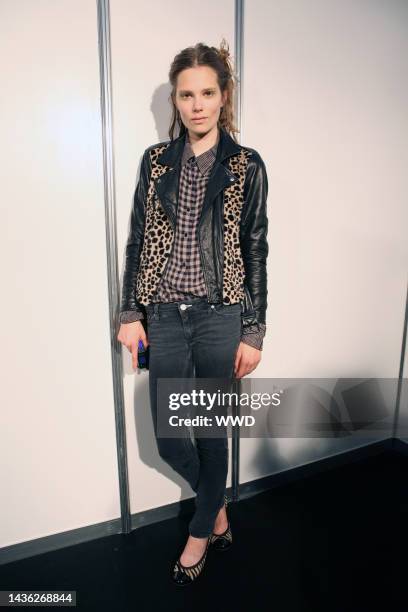 Model backstage at Alberta Ferretti's spring 2011 runway show.