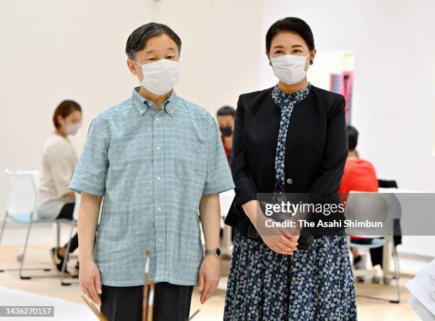 Emperor Naruhito and Empress Masako visit the Okinawa Craft Industry Promotion Center on October 23, 2022 in Tomigusuku, Okinawa, Japan.