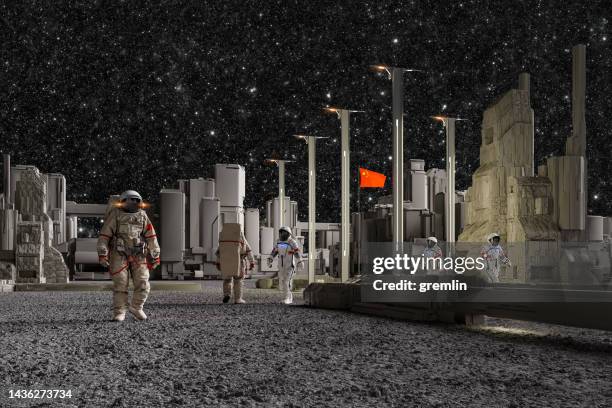 chinese astronauts working on moon base - army base stock pictures, royalty-free photos & images