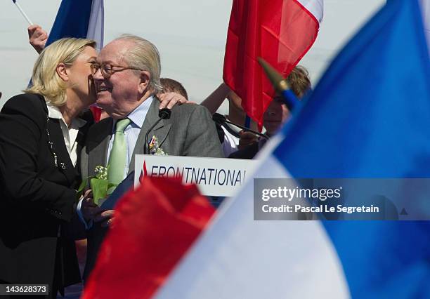 Marine Le Pen kisses her father Jean-Marie Le Pen during the French Far Right Party May Day demonstration on May 1, 2012 in Paris, France. Marine Le...
