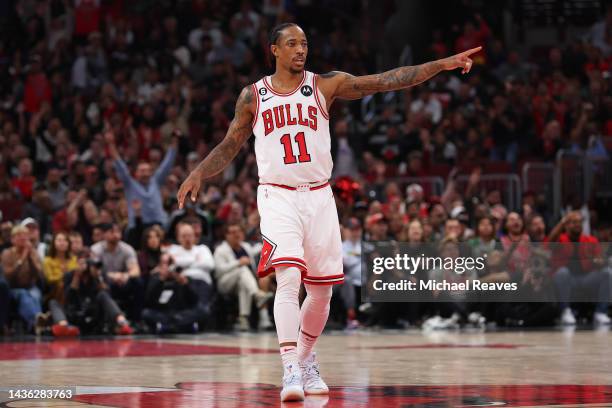 DeMar DeRozan of the Chicago Bulls celebrates a basket against the Boston Celtics during the second half at United Center on October 24, 2022 in...