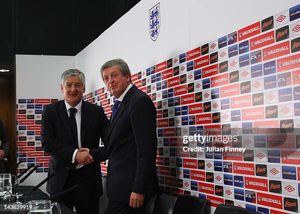 New England manager, Roy Hodgson shakes hands with the FA chairman, David Bernstein at a press conference at Wembley Stadium on May 1, 2012 in...