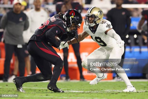 Wide receiver DeAndre Hopkins of the Arizona Cardinals makes a reception against safety Chris Harris Jr. #19 of the New Orleans Saints during the NFL...