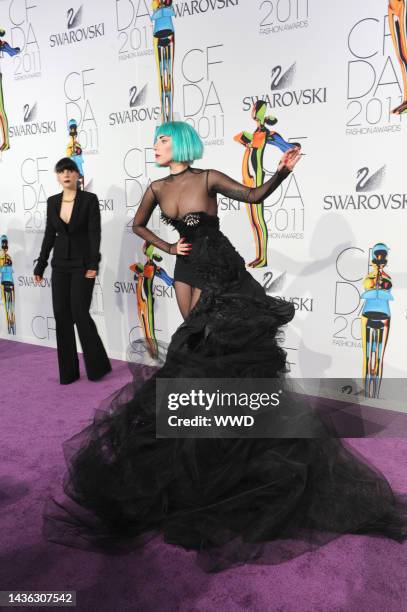 Natali Germanotta and Lady Gaga attend the Council of Fashion Designers of America's 2011 Fashion Awards at Lincoln Center's Alice Tully Hall.