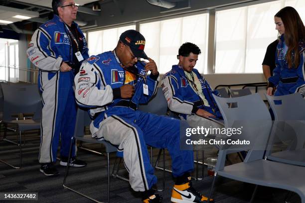 Arizona Diamondbacks players Stone Garrett and Josh Rojas attend the NASCAR Racing Experience Event at Phoenix Raceway on October 21, 2022 in...