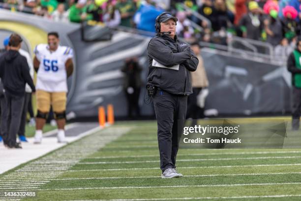 Head coach of the UCLA Bruins Chip Kelly stands on the sidelines during the first half against the Oregon Ducks at Autzen Stadium on October 22, 2022...