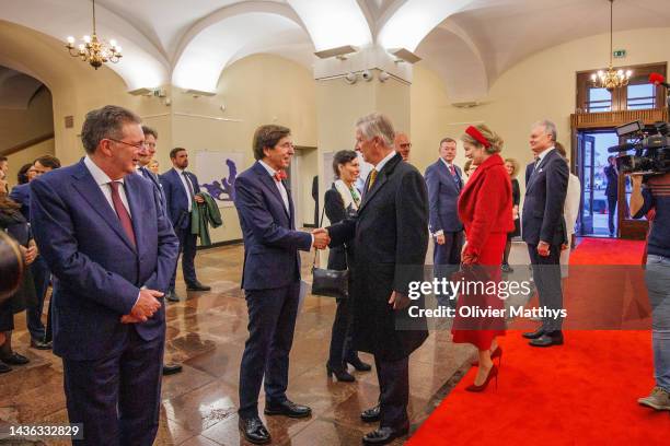 King Philippe of Belgium greets Walloon Minister-President Elio Di Rupo as Queen Mathilde, President of the Republic of Lithuania Gitanas Nausėda and...