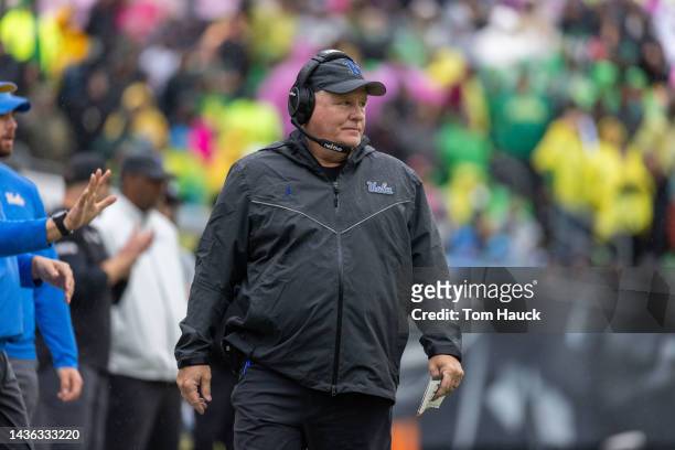 Head coach of the UCLA Bruins Chip Kelly stands on the sidelines during the first half against the Oregon Ducks at Autzen Stadium on October 22, 2022...