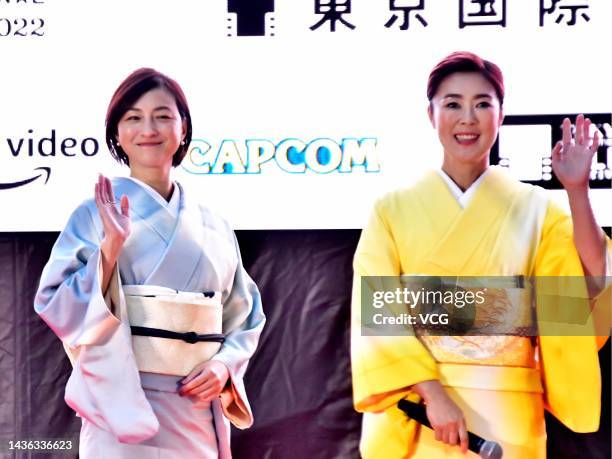 Japanese actress/singer Ryoko Hirosue and Japanese actress Shinobu Terajima arrive at opening ceremony red carpet for the 35th Tokyo International...