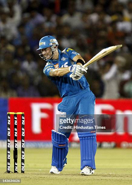 Pune Warriors batsman Michael Clarke plays a shot during IPL 5 T20 cricket match played between Deccan Chargers and Pune Warriors at Barbati Stadium...