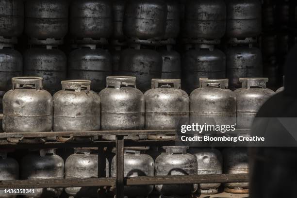 gas canisters stacked in a truck - canister stock pictures, royalty-free photos & images