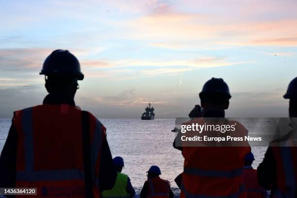 Workers await the arrival of the 2Africa submarine cable at the Barcelona Cable Landing Station in Sant Adria de Besos, on 25 October, 2022 in Sant...