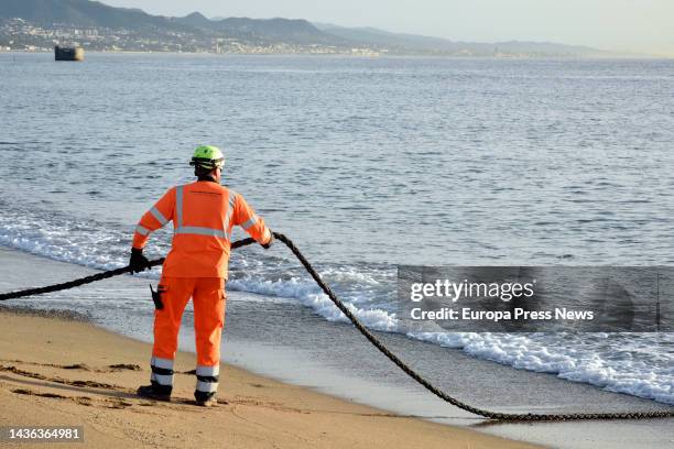 Worker with the 2Africa submarine cable as it arrives at the Barcelona Cable Landing Station in Sant Adria de Besos, on 25 October, 2022 in Sant...