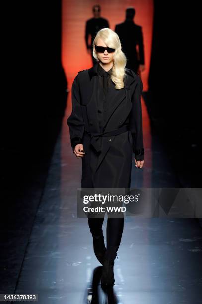 Model Andrej Pejic wears a pre-fall 2011 womenswear look on the runway at Jean Paul Gaultier\'s fall 2011 menswear show.