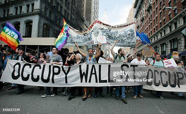 Occupy Wall Street protestors march down Fifth Avenue towards Union Square during a May Day rally on May 1, 2012 in New York City. Demonstrators have...