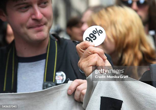 Occupy Wall Street protestors march down Fifth Avenue towards Union Square during a May Day rally on May 1, 2012 in New York City. Demonstrators have...