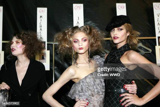 Models backstage at Christian Dior\'s fall 2010 runway show at Espace Ephemere Tuileries.