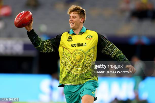 Cameron Green of Australia warms up with as Aussie rules football during the ICC Men's T20 World Cup match between Australia and Sri Lanka at Perth...