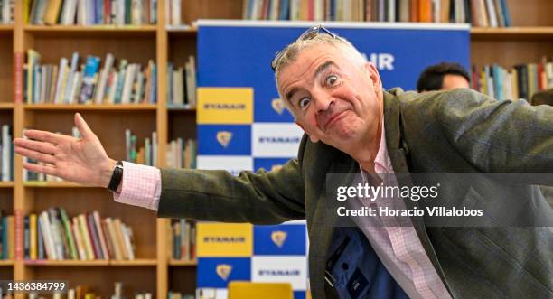 Ryanair Group CEO Michael O'Leary poses jokingly for pictures at the end of a press conference held on occasion of Ryanair 20th anniversary in the...