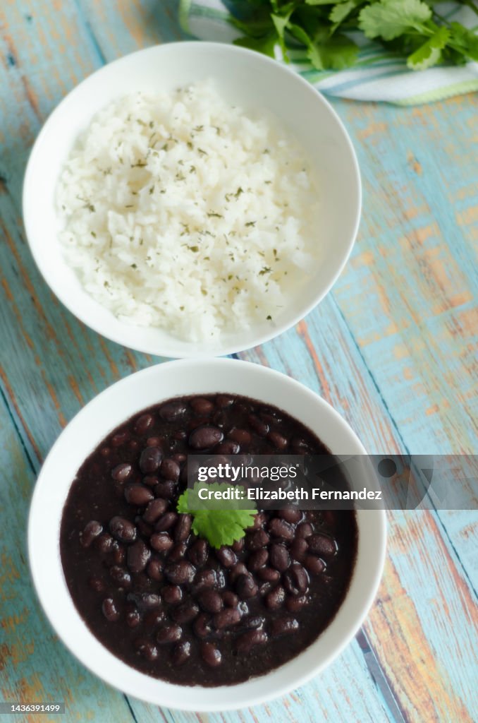 Black beans and white rice, top view.