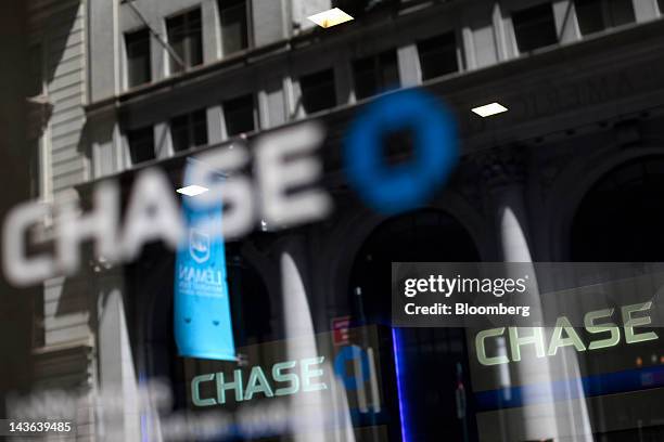 JPMorgan Chase & Co. Signage is displayed at a bank branch in New York, U.S., on Monday, April 30, 2012. Calls for a general strike with no work, no...