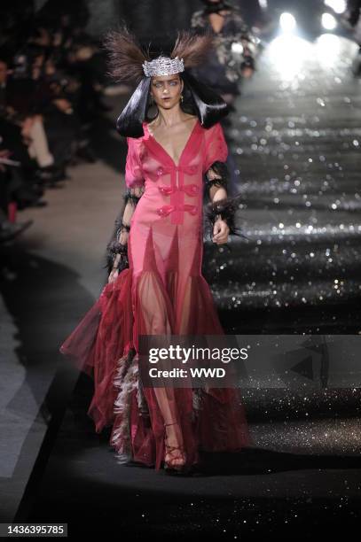 Model on the runway at John Galliano's fall 2010 show.