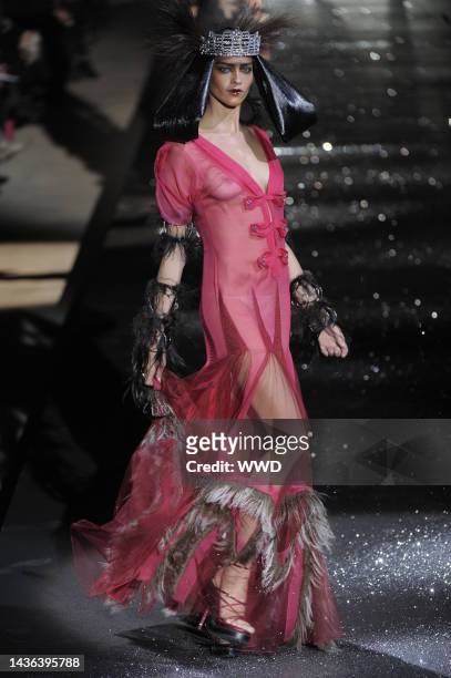 Model on the runway at John Galliano's fall 2010 show.