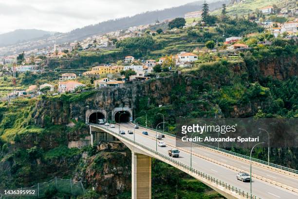 highway going through the tunnel on madeira island, portugal - funchal imagens e fotografias de stock