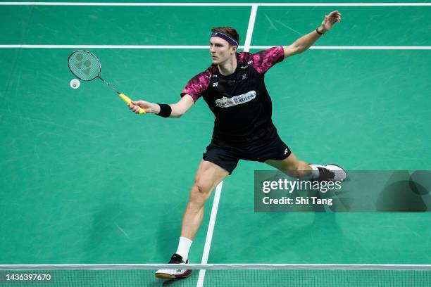 Viktor Axelsen of Denmark competes in the Men's Singles First Round match against Kenta Nishimoto of Japan during day one of the Yonex French Open at...