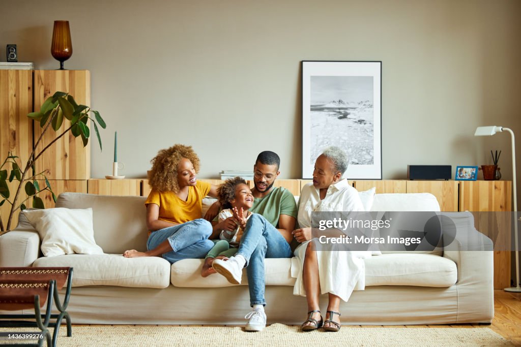African American happy family is enjoying in living room