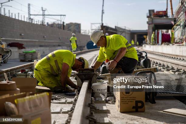 Railway personnel at the Sagrera-Sant Andreu AVE station railway works, on 25 October, 2022 in Barcelona, Catalonia, Spain. Work on the new...