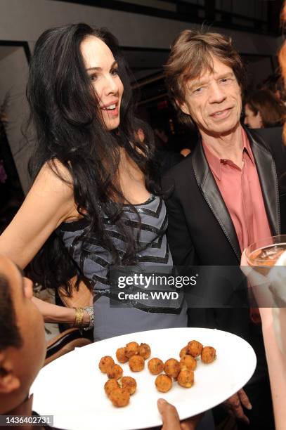 Designer L\'Wren Scott and Mick Jagger attend Scott\'s fall 2011 collection party at The Mark Hotel.