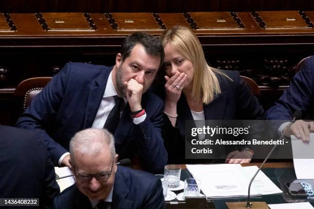 Italy's new Prime Minister Giorgia Meloni talks to Matteo Salvini, Minister of Sustainable infrastructures and Mobility ahead of a confidence vote at...