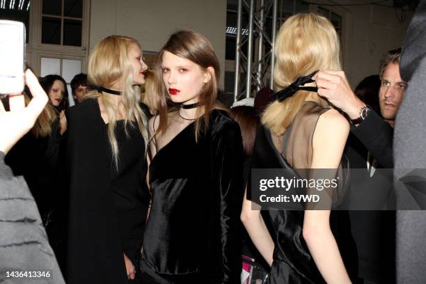 Models backstage at Givenchy's fall 2010 runway show.