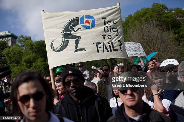 Demonstrators affiliated with the Occupy Wall Street movement rally at Union Square in New York, U.S., on Tuesday, May 1, 2012. Occupy Wall Street...