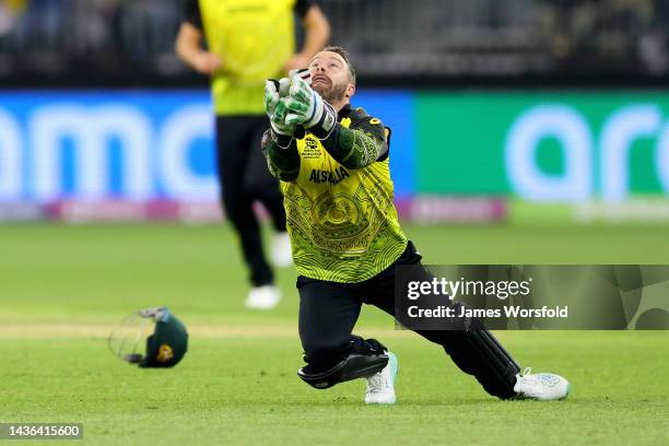 Matthew Wade of Australia makes the catch for a wicket during the ICC Men's T20 World Cup match between Australia and Sri Lanka at Perth Stadium on...