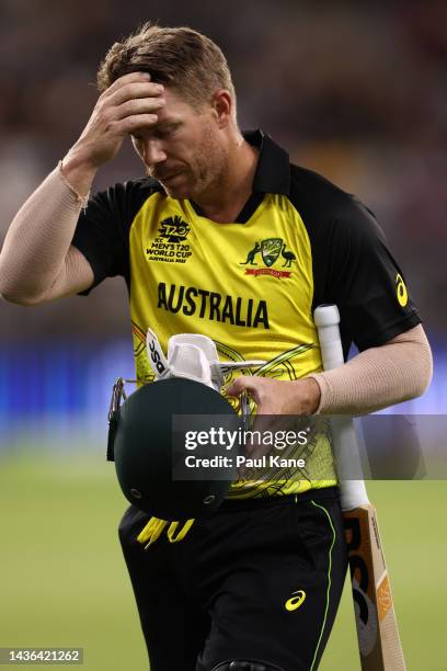 David Warner of Australia walks from the field after being dismissed during the ICC Men's T20 World Cup match between Australia and Sri Lanka at...