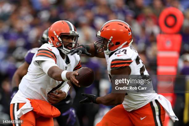 Quarterback Jacoby Brissett hands the ball off to running back Nick Chubb of the Cleveland Browns in the second half against the Baltimore Ravens at...