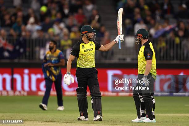 Marcus Stoinis of Australia celebrates his half century during the ICC Men's T20 World Cup match between Australia and Sri Lanka at Perth Stadium on...