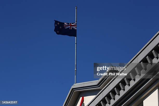 The New Zealand flag flys at half mast above Eden Park for the funeral service for former New Zealand All Black player and coach Sir Fred Allen at...