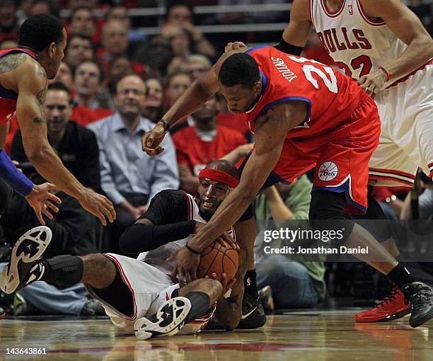 Richard Hamilton of the Chicago Bulls tries to keep the ball away from Thaddeus Young of the Philadelphia 76ers in Game Two of the Eastern Conference...